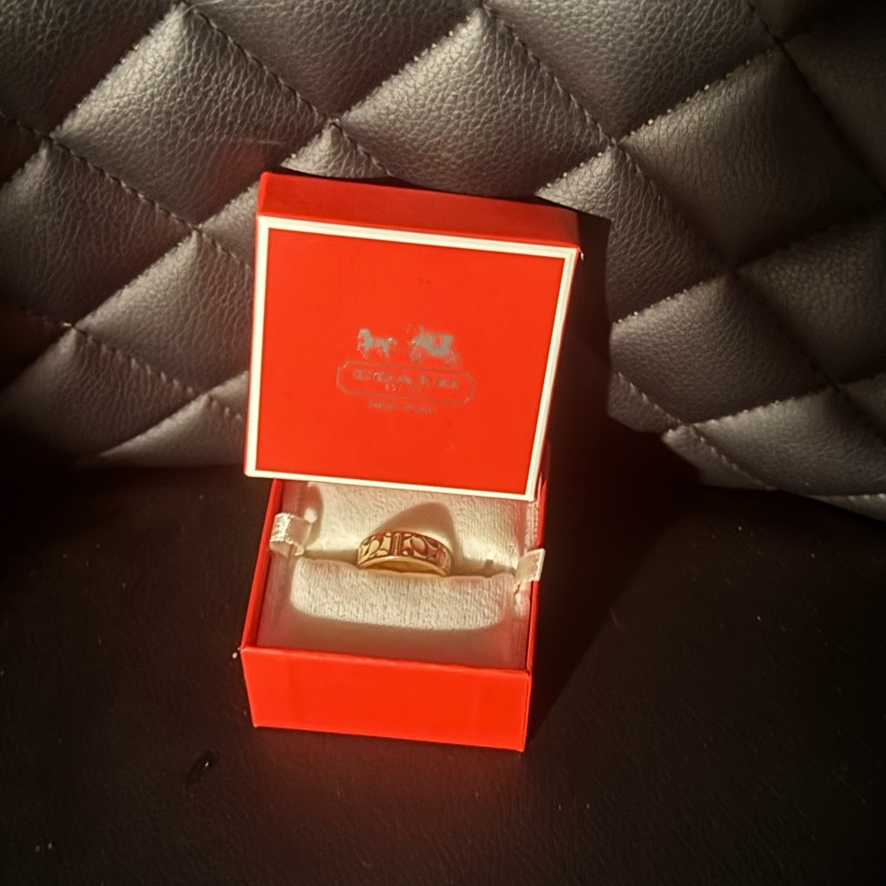 Coach Gold  and cream  color Ring with  Red Box included.